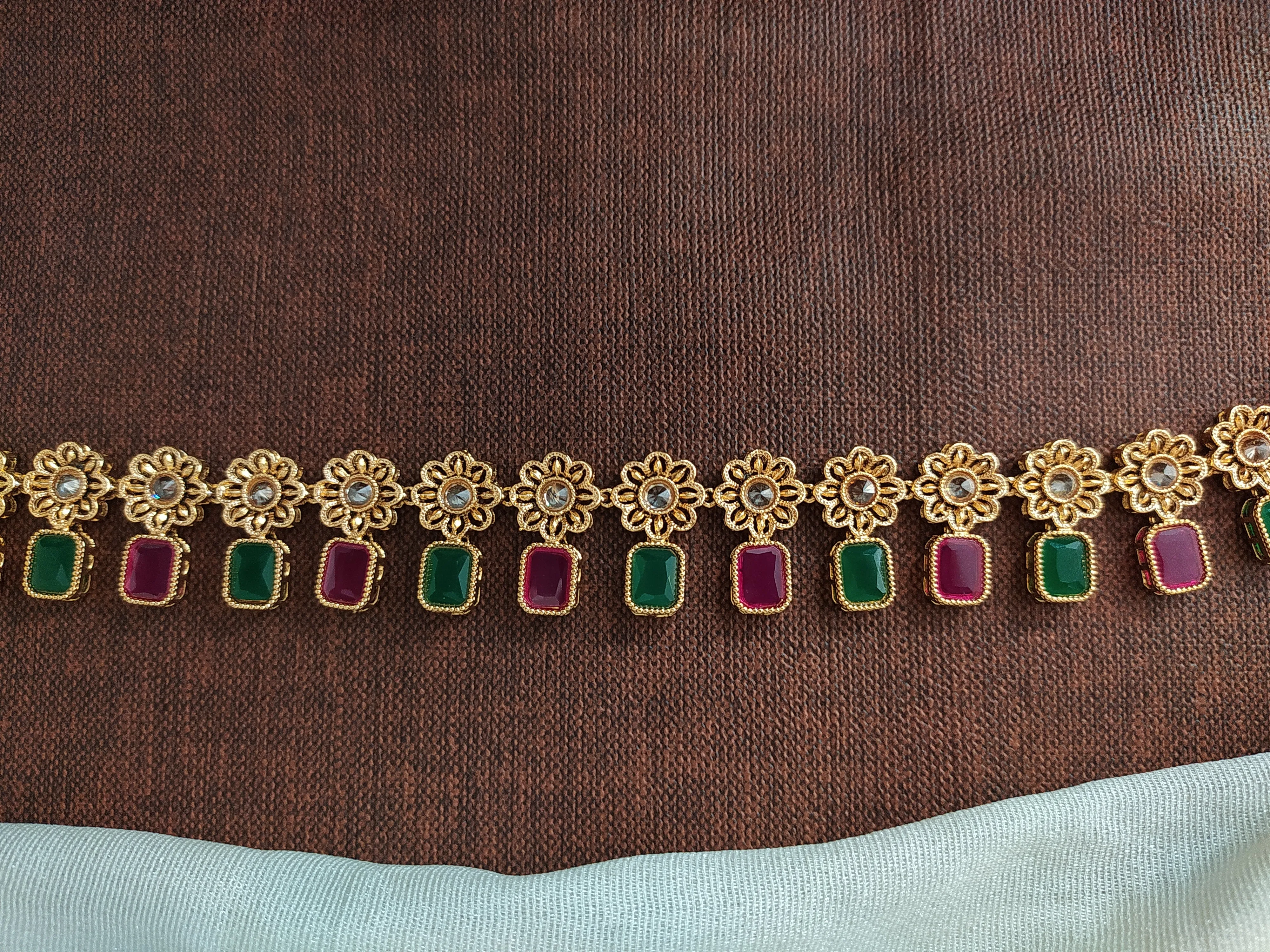 Gold-Plated Hip Chain with Red and Green Stones and Floral Design