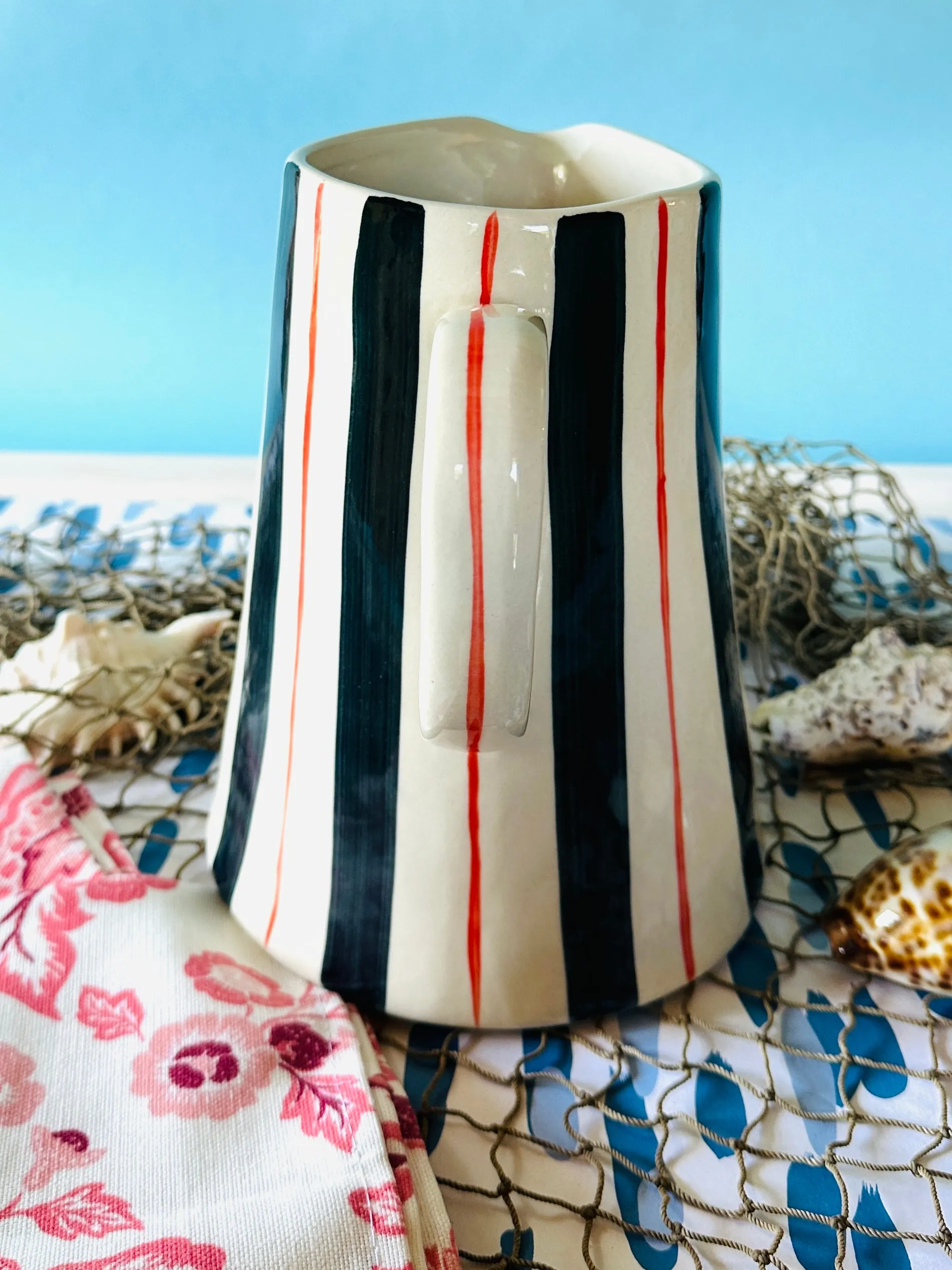 Hand-Painted Blue-and-Red Striped Stoneware Pitcher